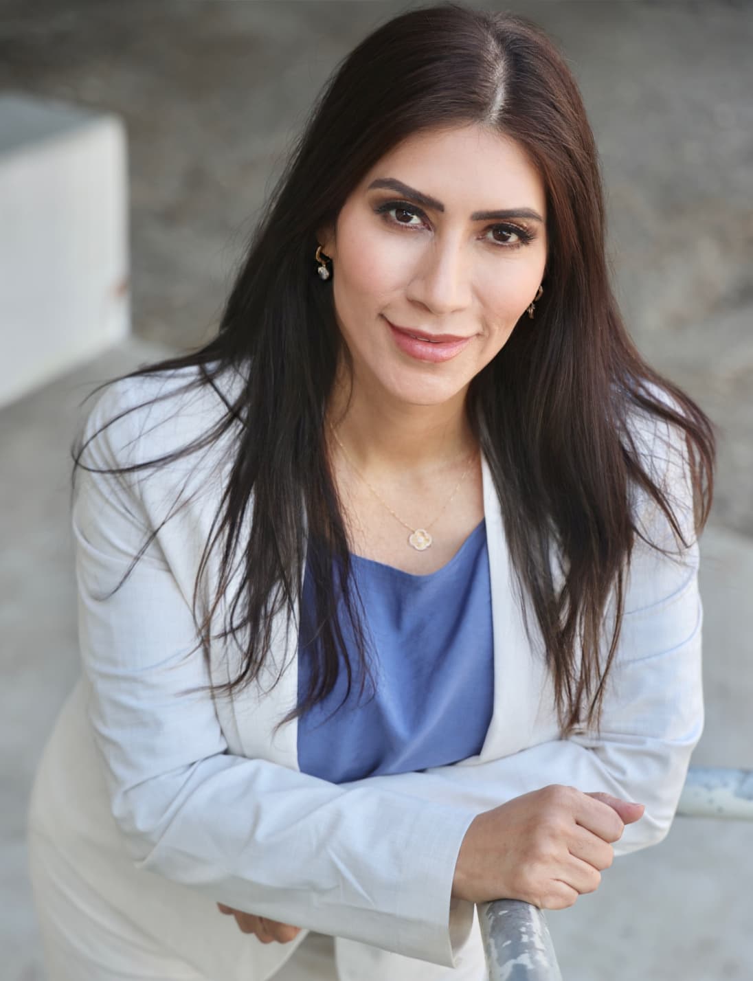 Maria Martinez, warmly inviting you to begin