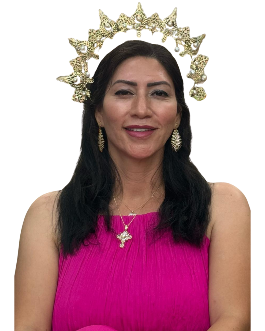 Maria Martinez in a pink top wearing a gold crown headpiece